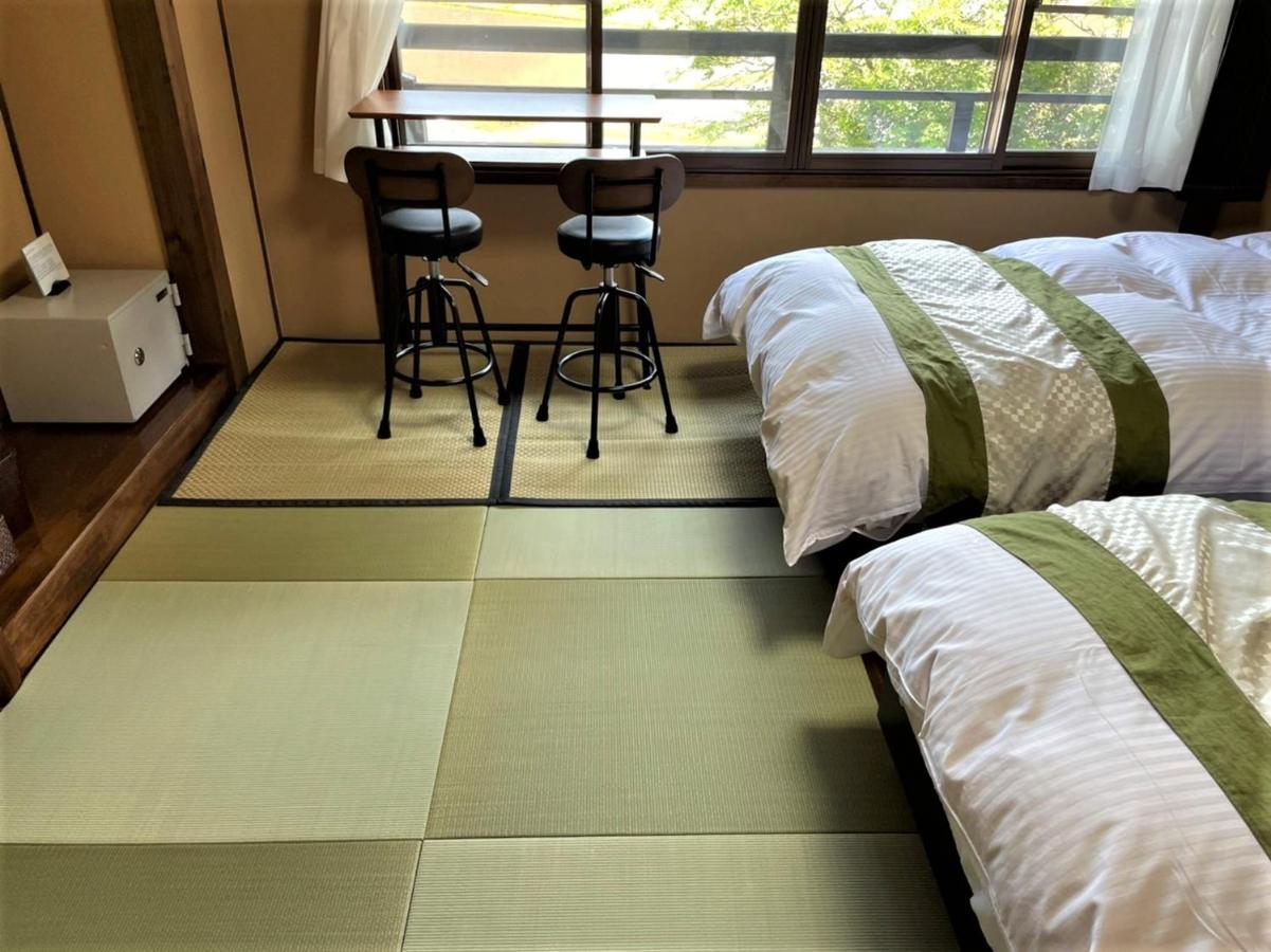 Sanso Tanaka Hotel Yufu Buitenkant foto