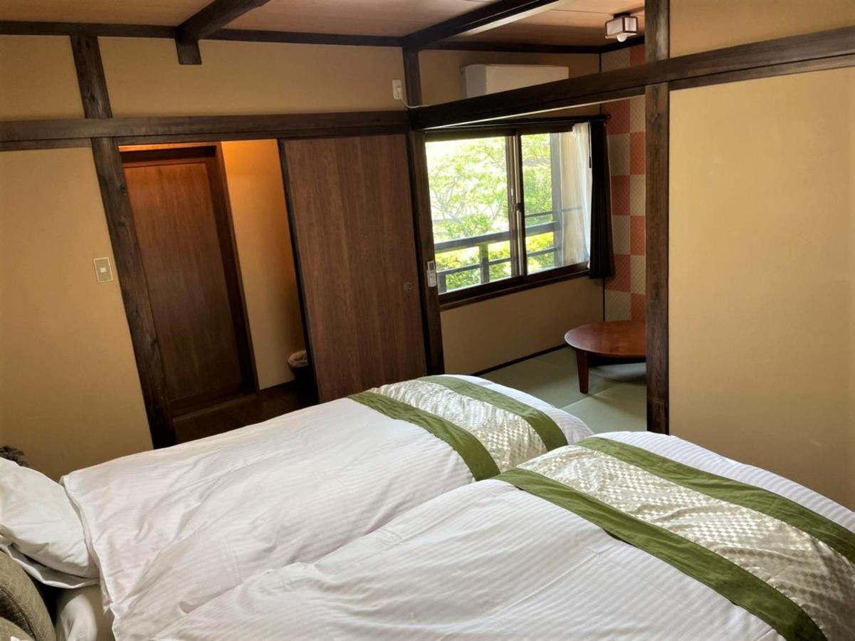 Sanso Tanaka Hotel Yufu Buitenkant foto